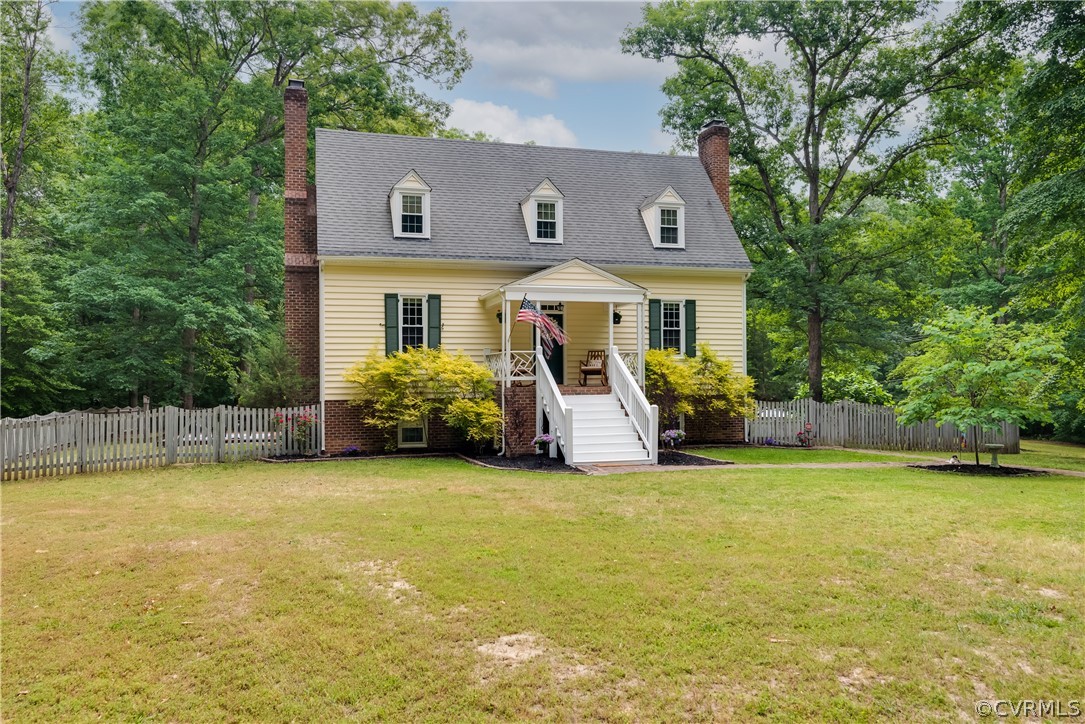 4616 Ladysmith Road Ruther Glen, VA 22546 - Photo 3 of 44 a view of a house with swimming pool and a garden