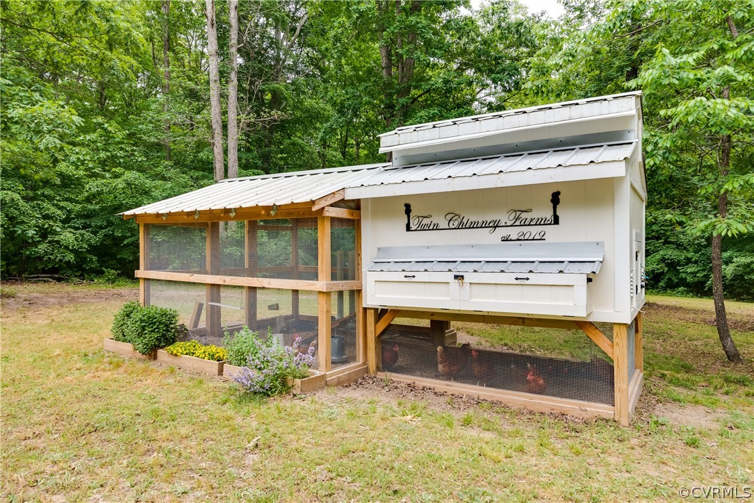 4616 Ladysmith Road Ruther Glen, VA 22546 - Photo 39 of 44 a view of a house with a yard