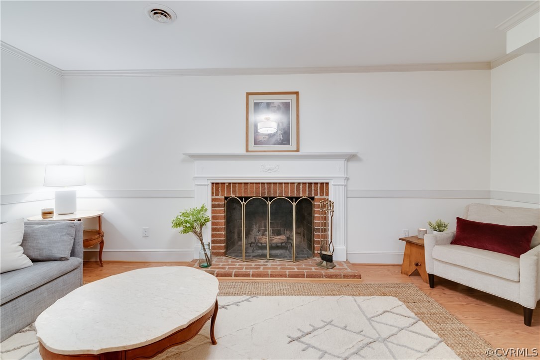 4616 Ladysmith Road Ruther Glen, VA 22546 - Photo 7 of 44 a living room with furniture and a fireplace