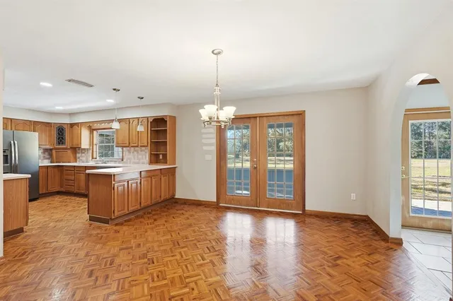 a view of kitchen with furniture and window