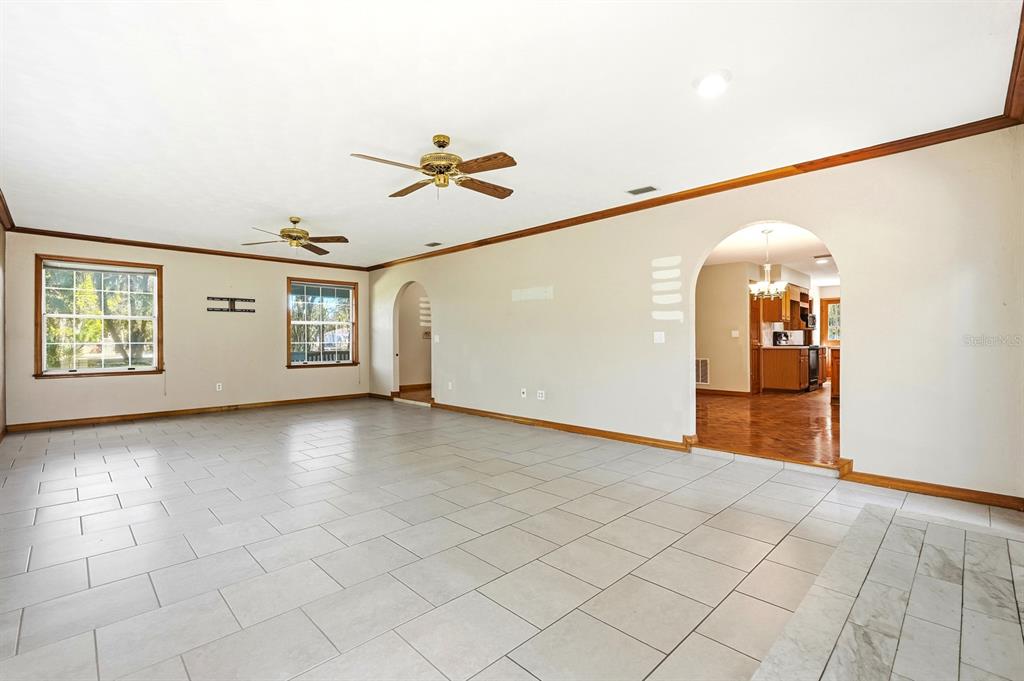 404 Old Haw Creek Road Bunnell, FL 32110 - Photo 16 of 51 a view of a livingroom with a staircase