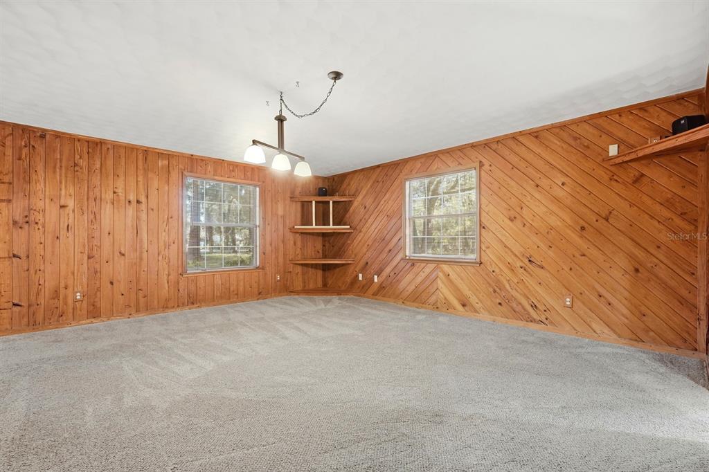 404 Old Haw Creek Road Bunnell, FL 32110 - Photo 21 of 51 a view of an empty room with a window