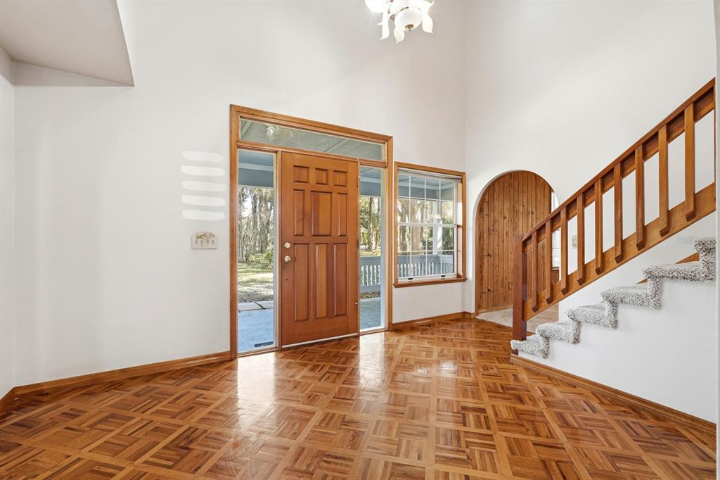 404 Old Haw Creek Road Bunnell, FL 32110 - Photo 6 of 51 a view of an entryway with wooden floor