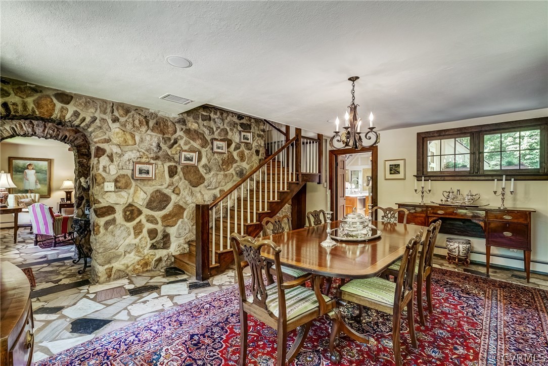 207 Wood Road Henrico, VA 23229 - Photo 12 of 50 Dining room with solid stone wall, marble floor, a
