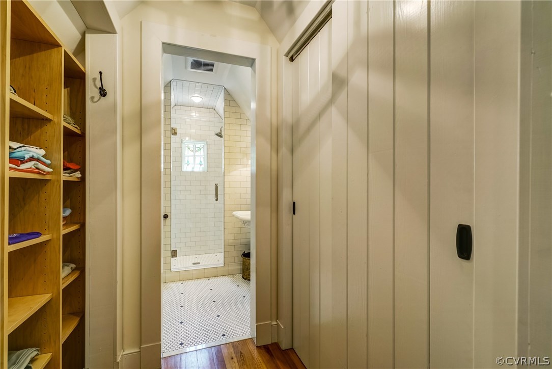 207 Wood Road Henrico, VA 23229 - Photo 29 of 50 Walk-in closet and ensuite bathroom with shower an