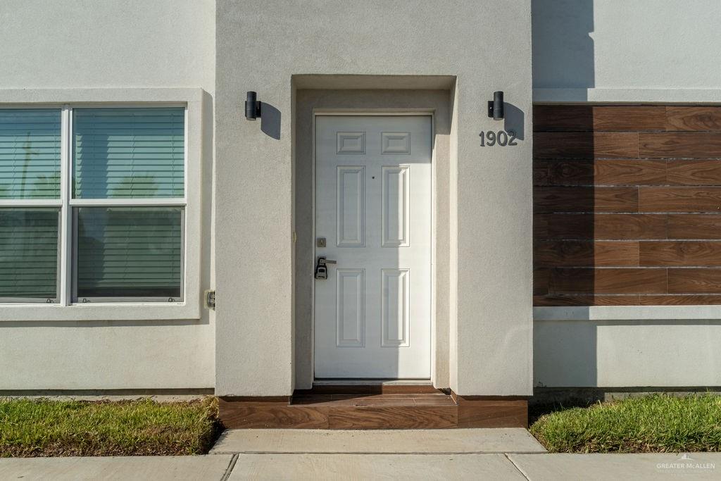 a front view of a house with a garage