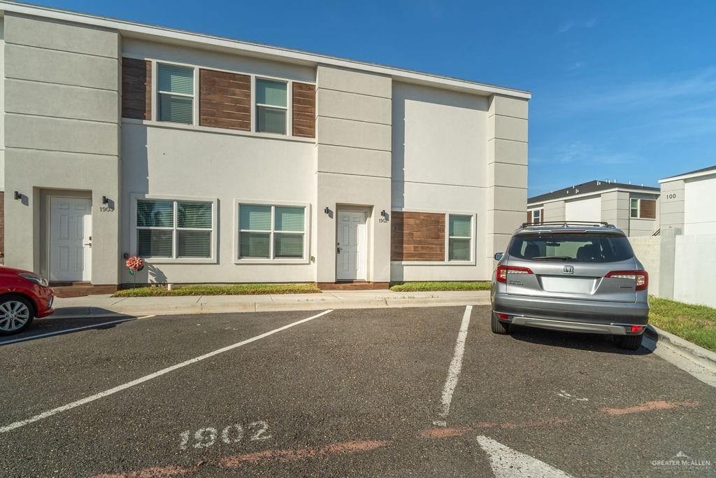901 East Yuma Avenue, Unit 1902 McAllen, TX 78503 - Photo 2 of 13 a car parked in front of a building