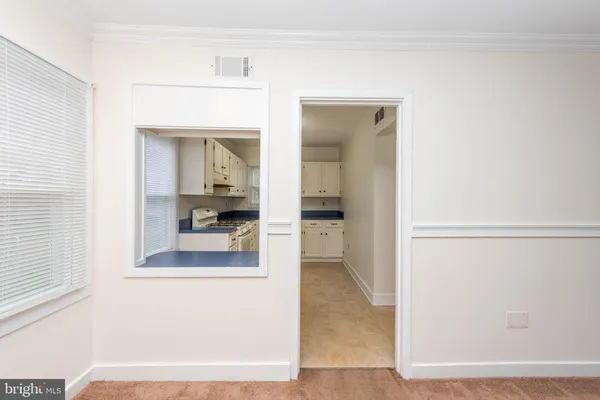 a bathroom with a tub shower and sink