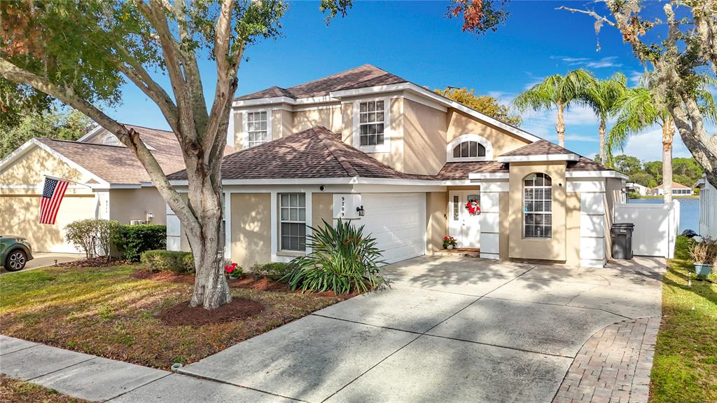 9709 Fredericksburg Road Tampa, FL 33635 - Photo 1 of 1 a front view of a house with a porch