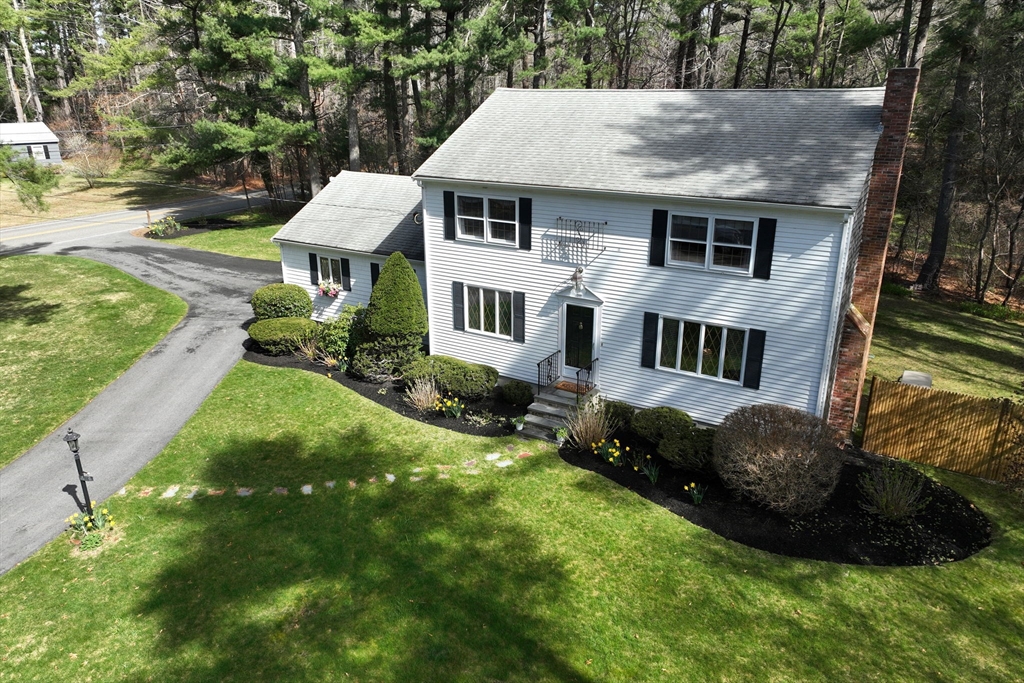 339 School Street Marshfield, MA 02050 - Photo 1 of 40 a aerial view of a house with a yard table and chairs