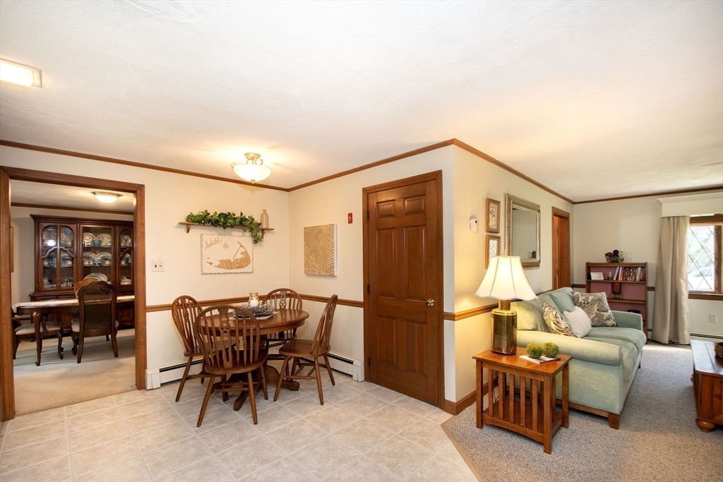 339 School Street Marshfield, MA 02050 - Photo 12 of 40 a dining room with furniture and a refrigerator