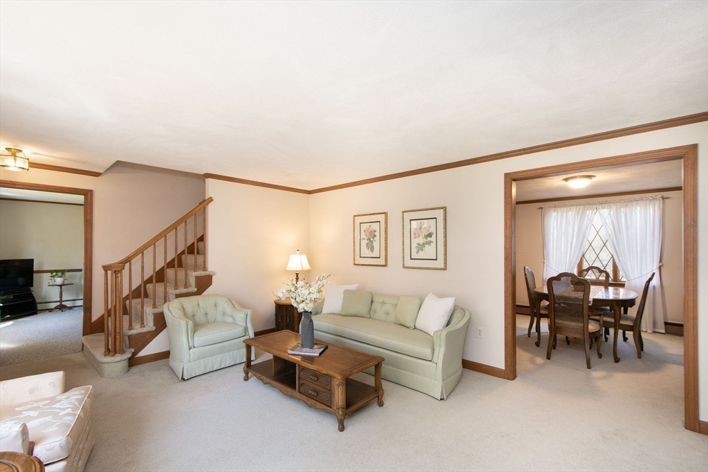 339 School Street Marshfield, MA 02050 - Photo 19 of 40 a living room with furniture and a wooden floor