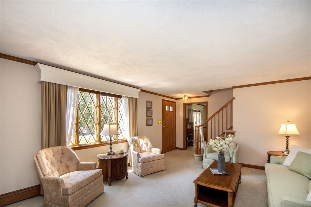 339 School Street Marshfield, MA 02050 - Photo 21 of 40 a living room with furniture and a large window