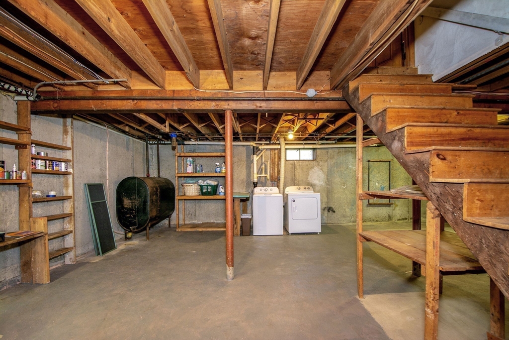 339 School Street Marshfield, MA 02050 - Photo 34 of 40 a view of an empty room with a garage