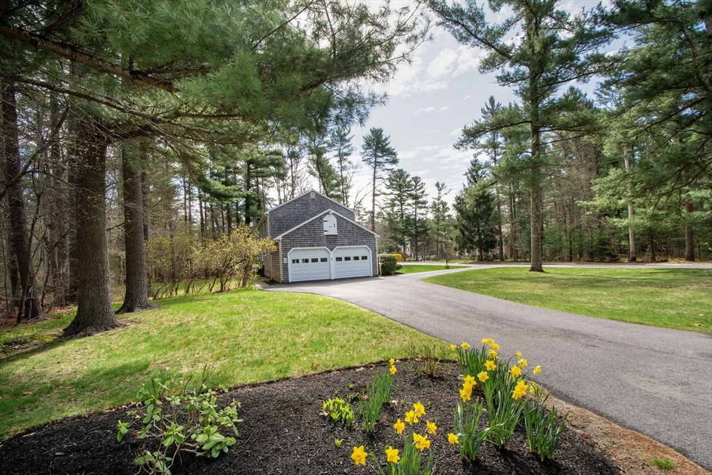 339 School Street Marshfield, MA 02050 - Photo 5 of 40 a front view of a house with garden