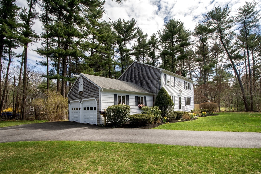 339 School Street Marshfield, MA 02050 - Photo 7 of 40 a front view of a house with a garden