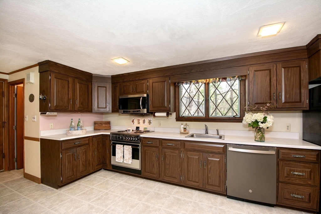 339 School Street Marshfield, MA 02050 - Photo 10 of 40 a kitchen with lots of counter space sink and cabinets