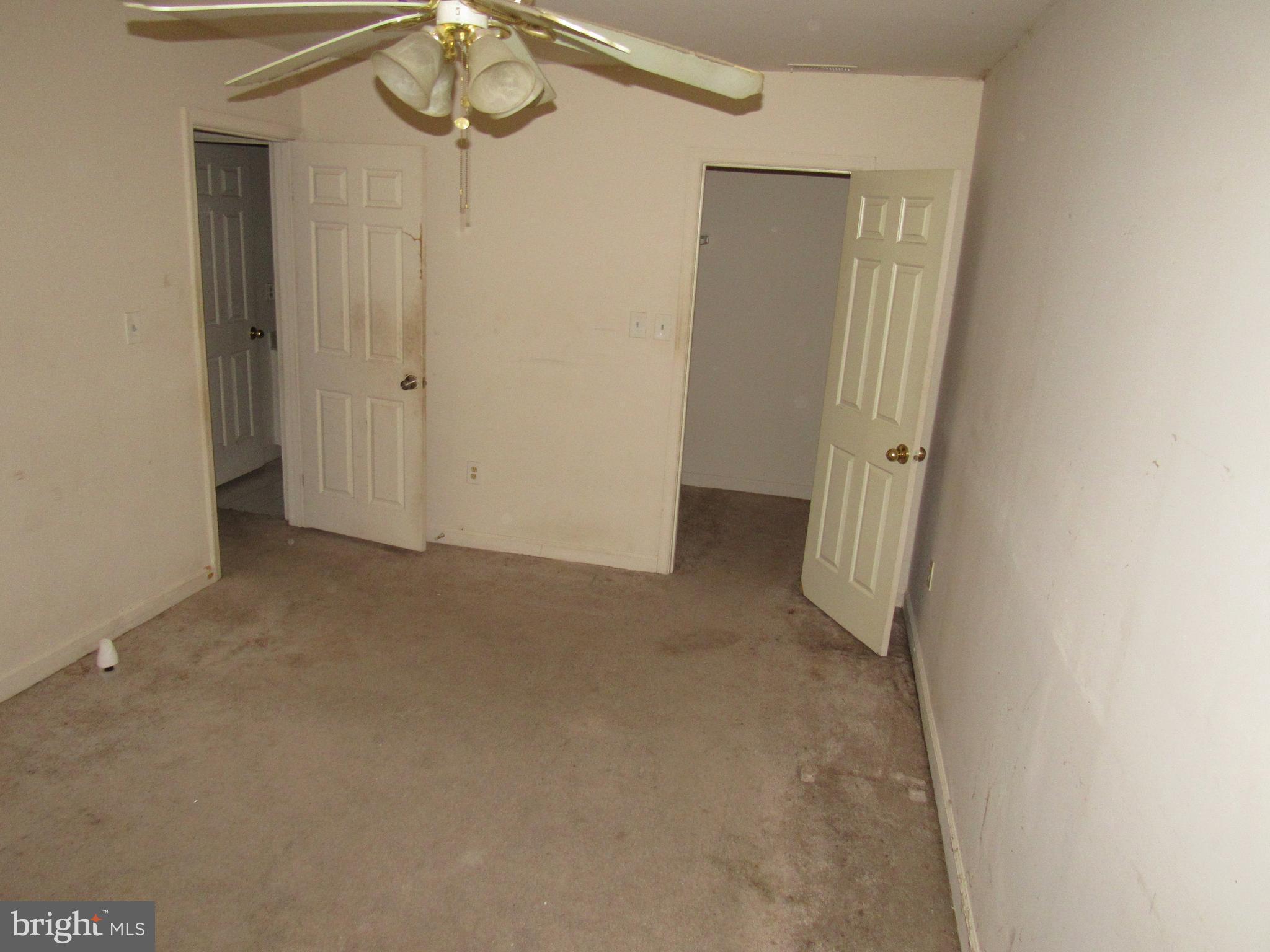 6708 Ridge Road, Unit 102 Baltimore, MD 21237 - Photo 9 of 14 a view of hallway with chandelier
