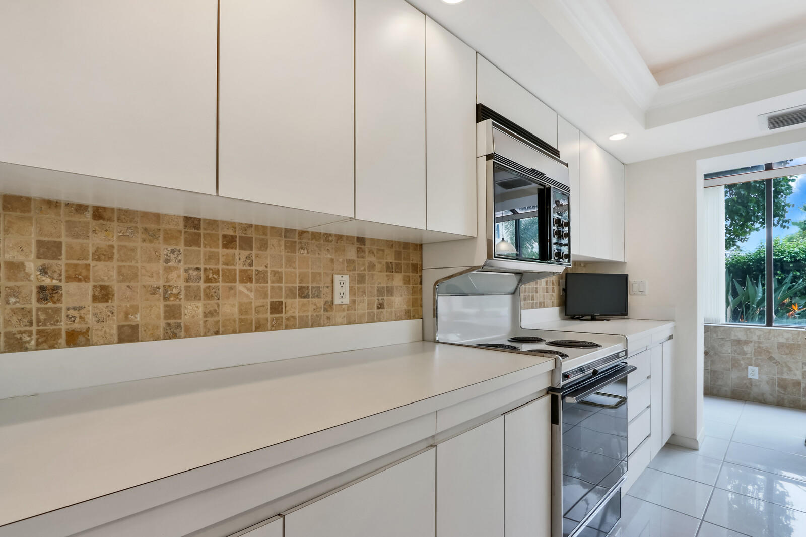1100 Surf Road, Unit 113 Singer Island, FL 33404 - Photo 8 of 37 Kitchen