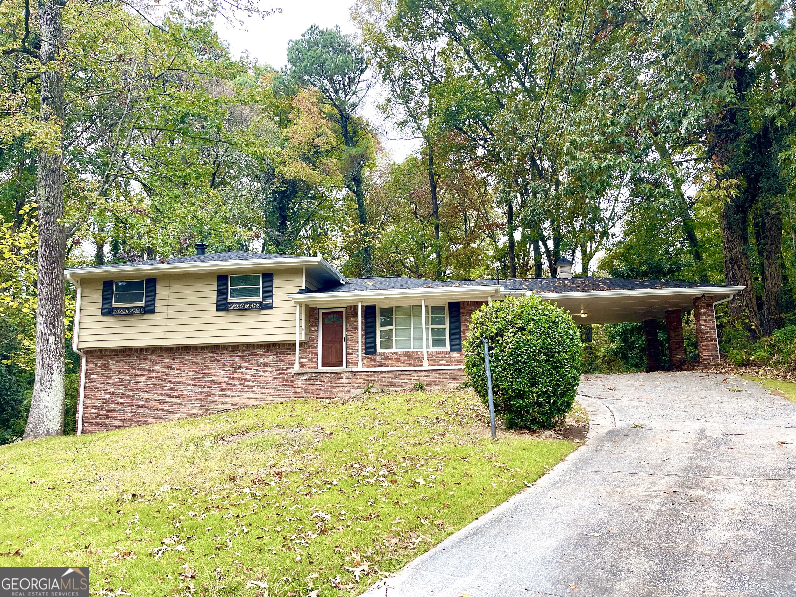 front view of a house with a yard