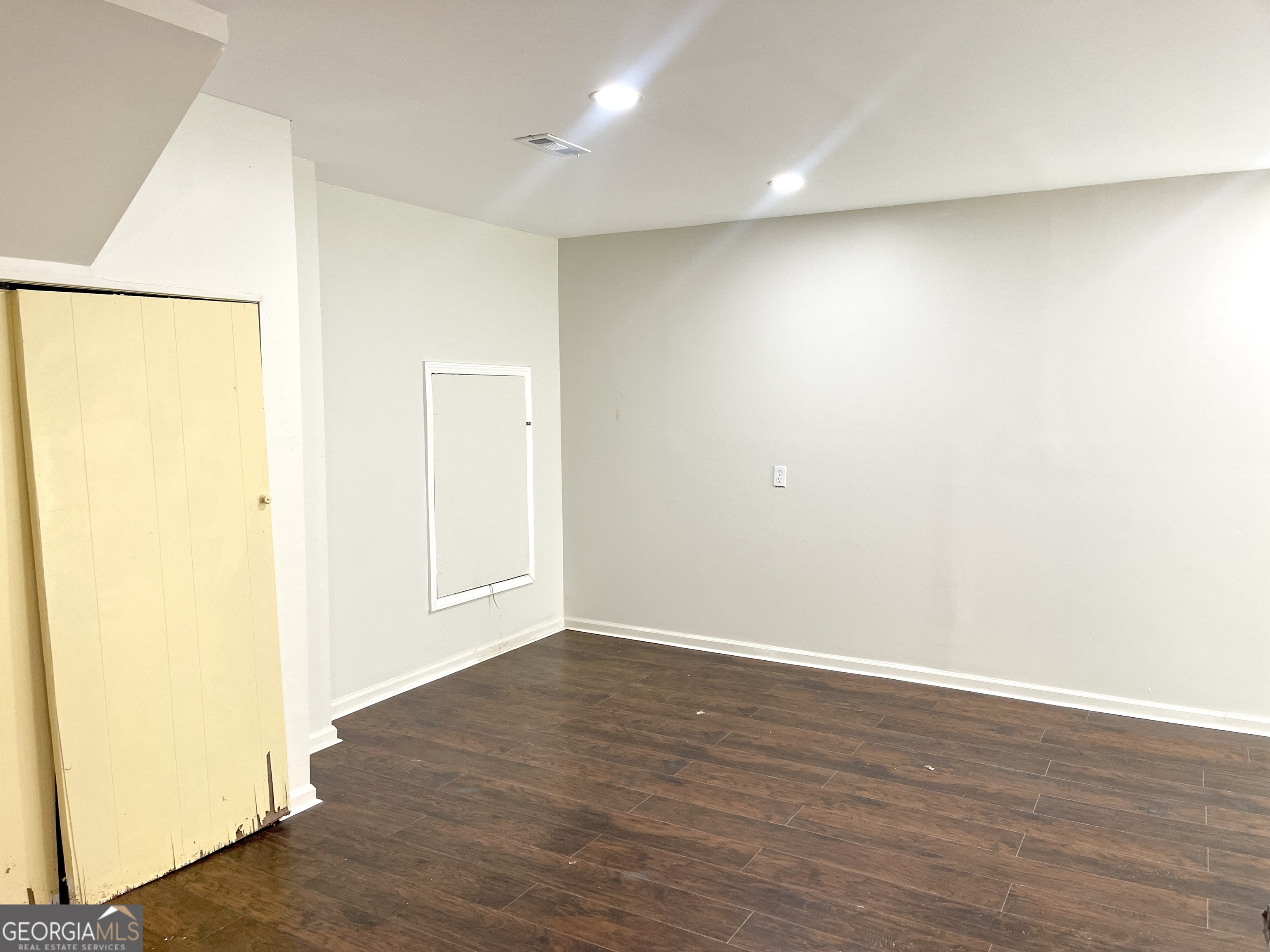 5435 Winstead Court Southwest South Fulton, GA 30349 - Photo 19 of 20 an empty room with wooden floor