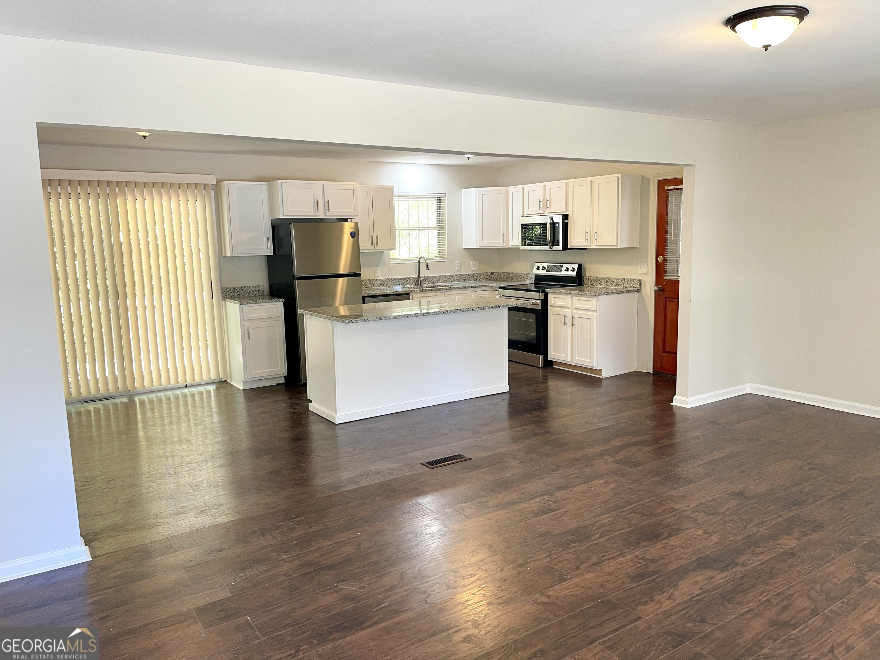 5435 Winstead Court Southwest South Fulton, GA 30349 - Photo 2 of 20 a kitchen with sink and cabinets