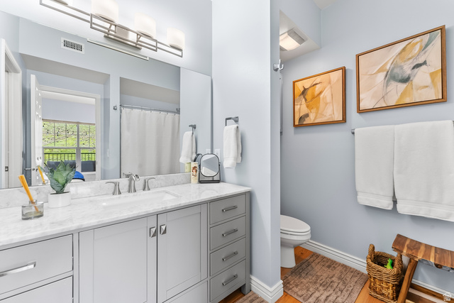 900 Bitner Road, Unit K25 Park City, UT 84098 - Photo 18 of 35 Bathroom featuring a double vanity with a light gray cabinet base, white countertop, and dual sinks