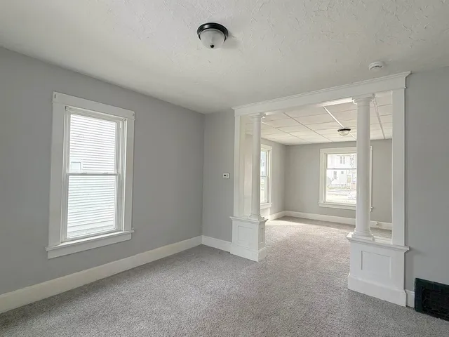 an empty room with windows