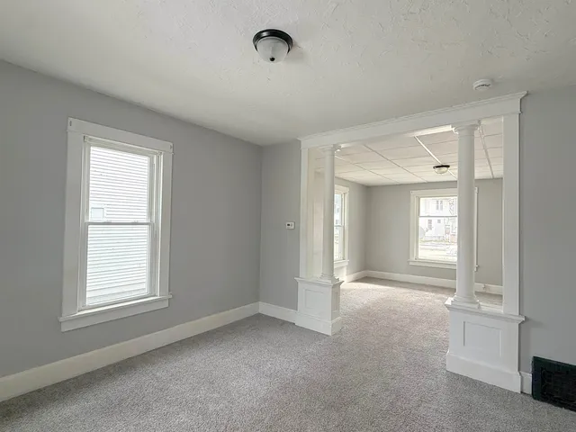 an empty room with windows