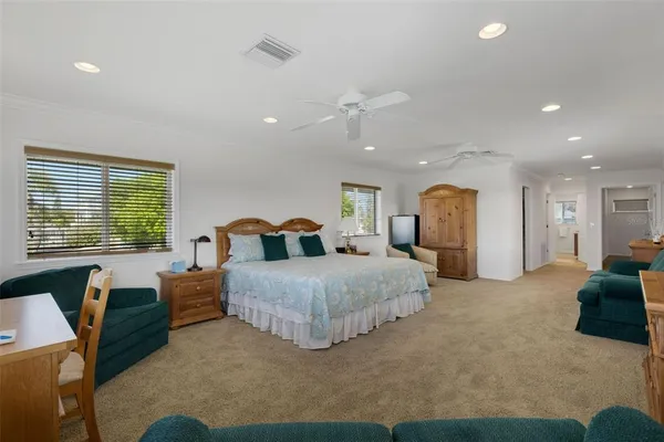 a view of livingroom with hardwood floor and ceiling fan