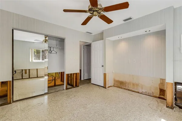 a view of a pathway with a backyard