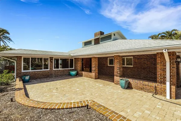 a front view of a house with natural light