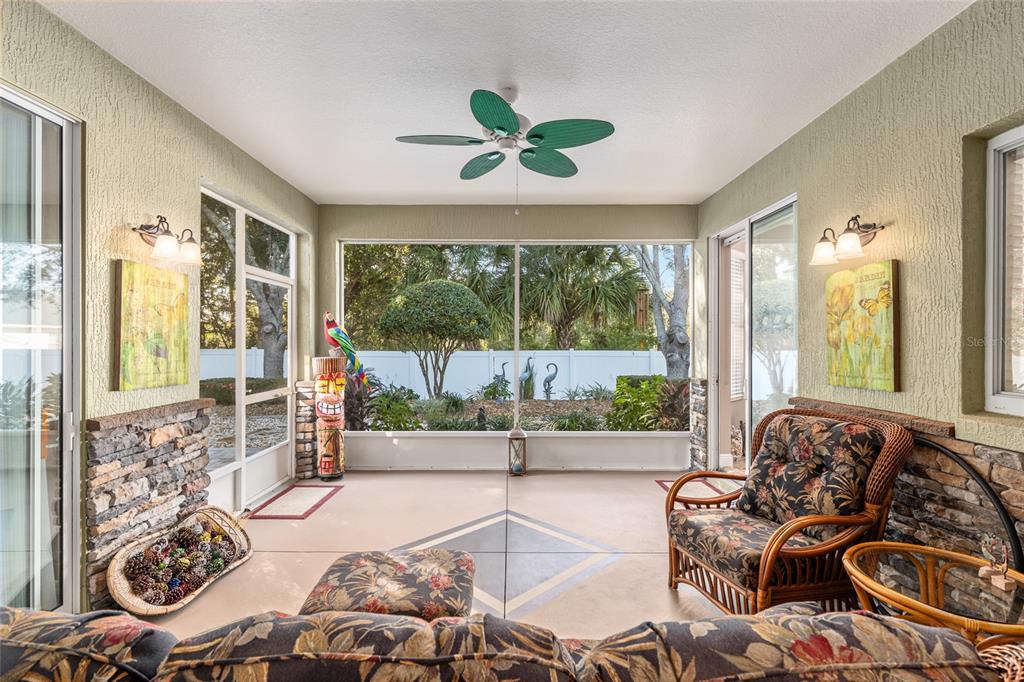 16116 Southwest 15th Court Ocala, FL 34473 - Photo 66 of 81 a living room with furniture and a large window