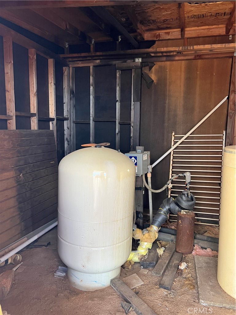 45080 Terwilliger Road Anza, CA 92539 - Photo 2 of 45 a room with water heater and wooden cabinets