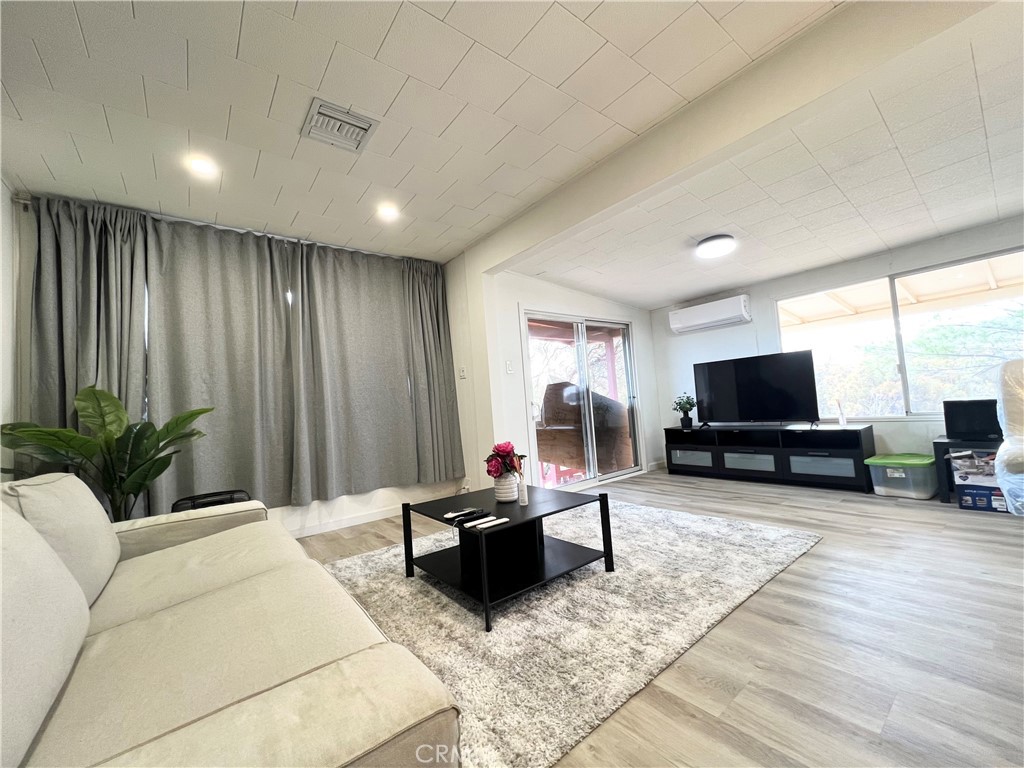 45080 Terwilliger Road Anza, CA 92539 - Photo 29 of 45 a living room with furniture and a flat screen tv