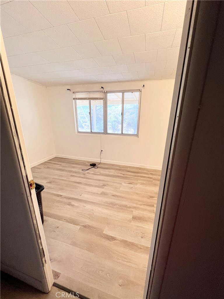 45080 Terwilliger Road Anza, CA 92539 - Photo 35 of 45 a view of wooden floor and windows in a room