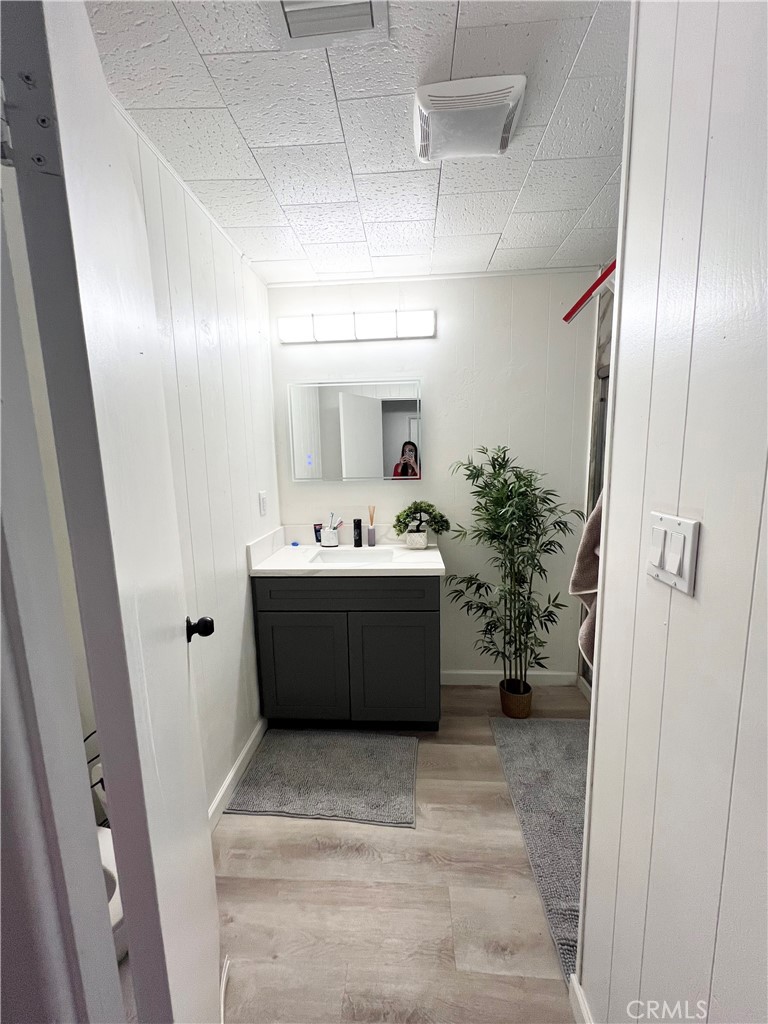 45080 Terwilliger Road Anza, CA 92539 - Photo 38 of 45 a bathroom with a sink a mirror and a shower