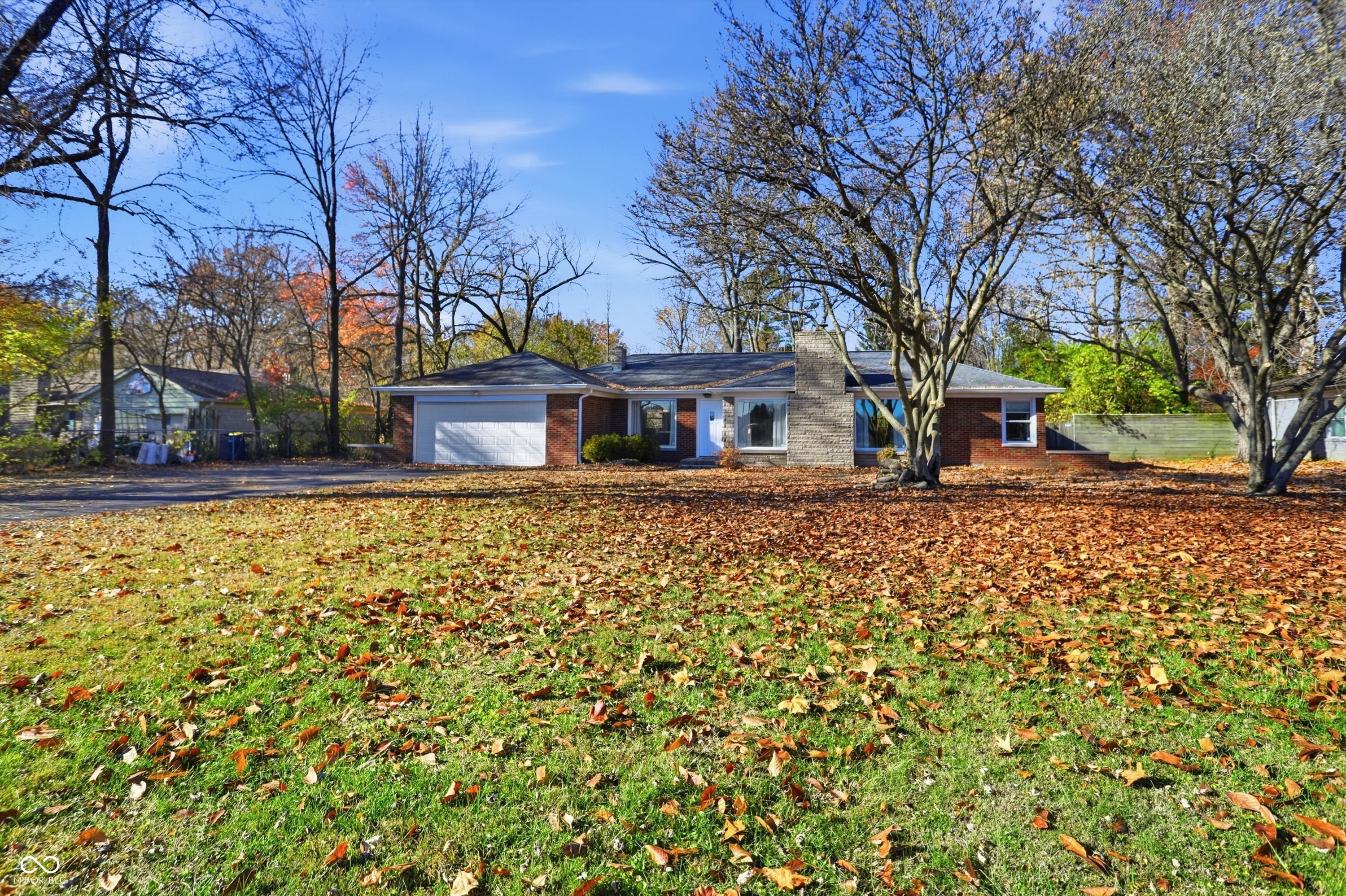 7026 Spring Mill Road Indianapolis, IN 46260 - Photo 3 of 48