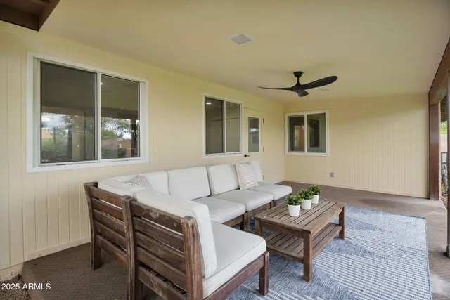 a living room with furniture and window