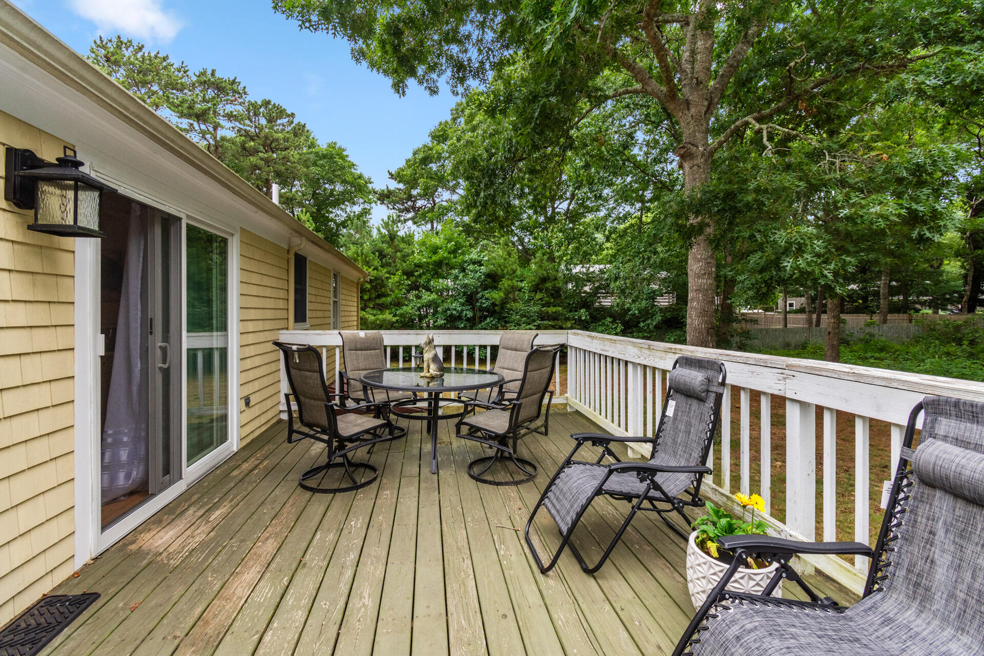 30 Patience Lane Cotuit, MA 02635 - Photo 20 of 27 a view of a deck patio and outdoor seating