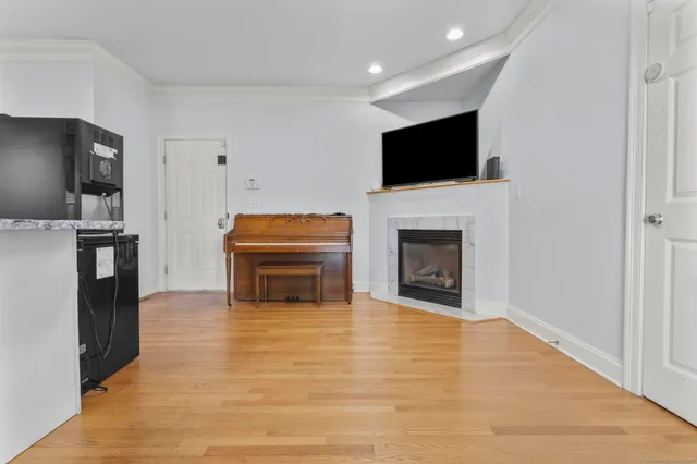 a view of living room with furniture and a flat screen tv