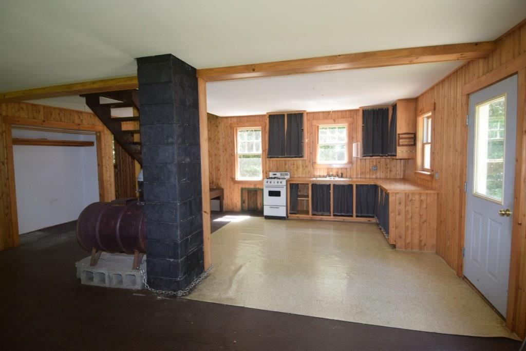 148 Loon Road Embden, ME 04958 - Photo 9 of 17 Living room & kitchen