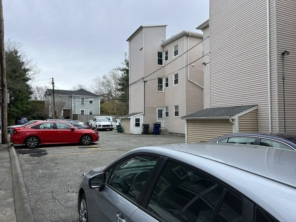 2 Sherman Street, Unit 2A3 Cambridge, MA 02138 - Photo 18 of 18 a view of a car parked in front of a house