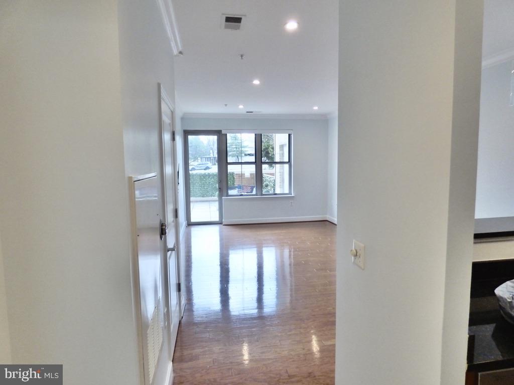 11800 Sunset Hills Road, Unit 118 Reston, VA 20190 - Photo 4 of 52 Spacious entryway with natural light.