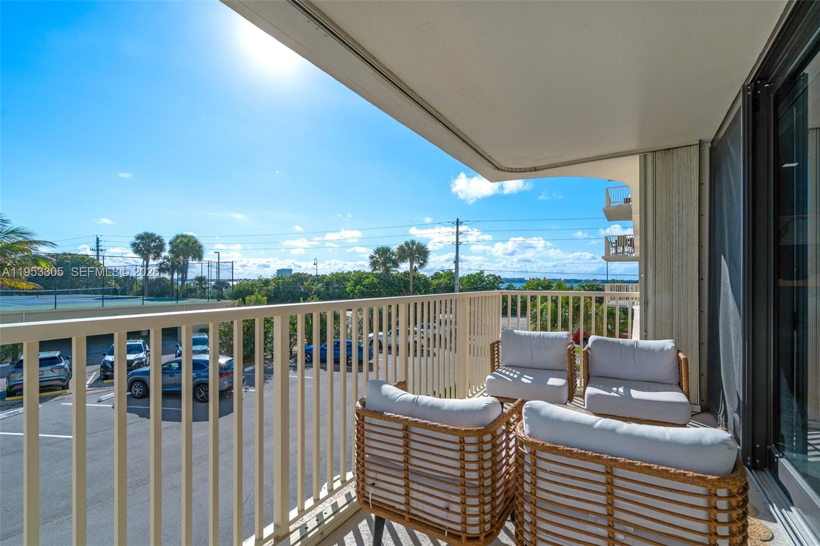 5480 North Ocean Drive, Unit B1B Singer Island, FL 33404 - Photo 33 of 41 a roof deck with couches and wooden floor
