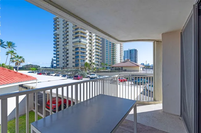 a view of balcony with furniture