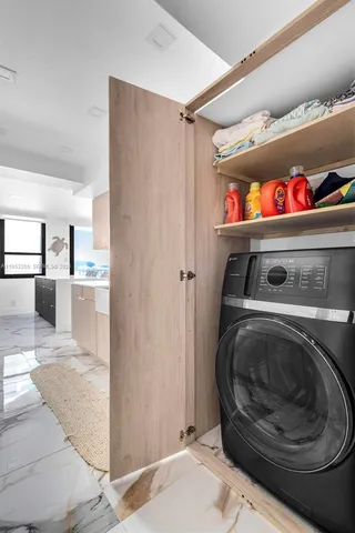 a bathroom with a shower a sink and a mirror