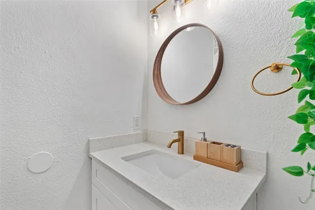 a bedroom with bed and windows