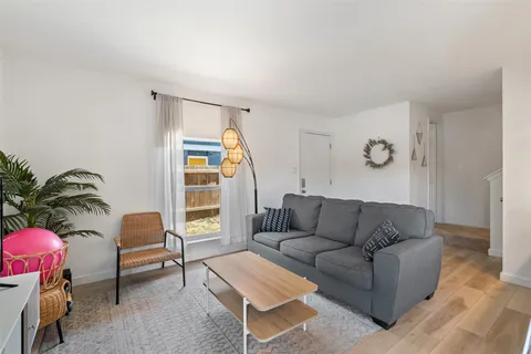 a living room with furniture and a couch