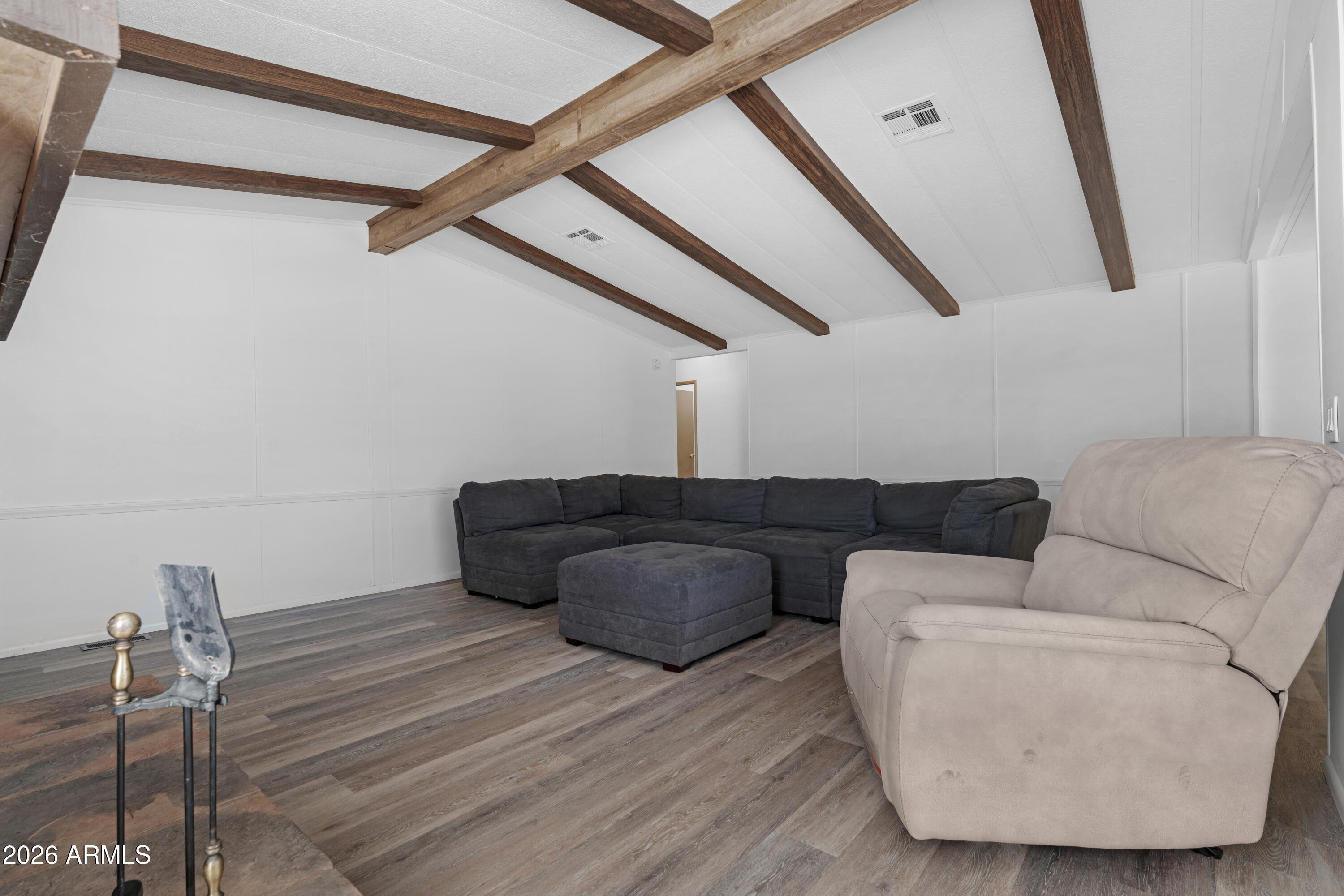 53925 West Stallion Road Maricopa, AZ 85139 - Photo 18 of 46 a living room with furniture and a ceiling fan